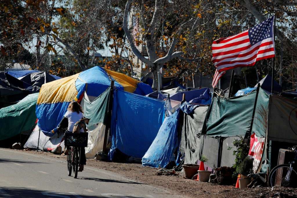 City officials have begun what they are calling a slow and methodical clean-up and removal of a large homeless encampment along the Santa Ana River Trail in Anaheim, California